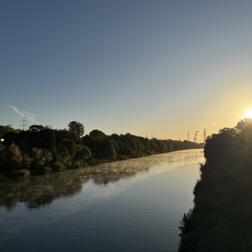 Misty Canal at Sunrise